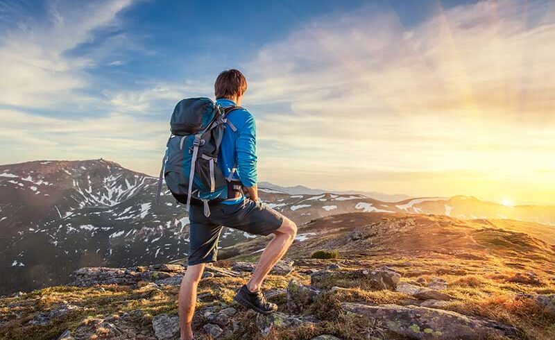 Backpacker-on-top-of-a-mountain